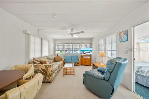 LOOKING INTO LIVING ROOM FROM KITCHEN AREA