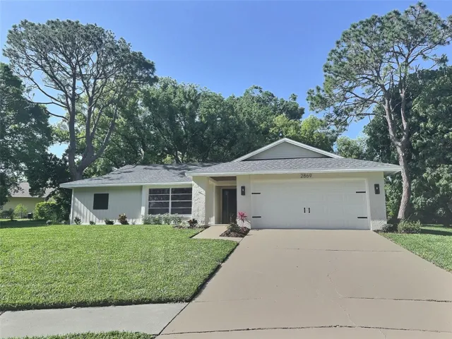 striking curb appeal. new sod, fresh landscaping