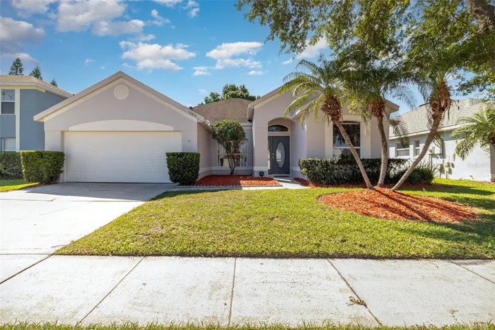 Freshly painted exterior and newly mulched landscape adds to curb appeal.