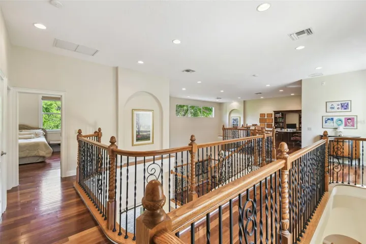 2nd level with arched art niches.