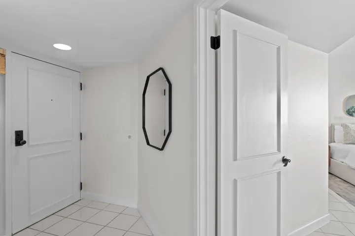 Facing front door and door to primary bedroom