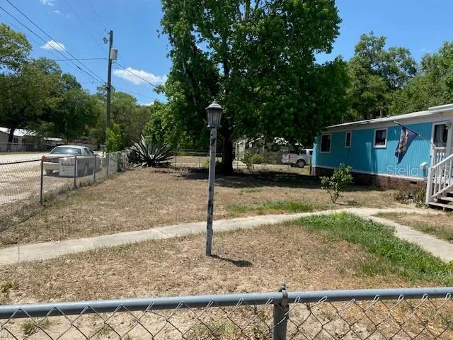 Front fenced in yard