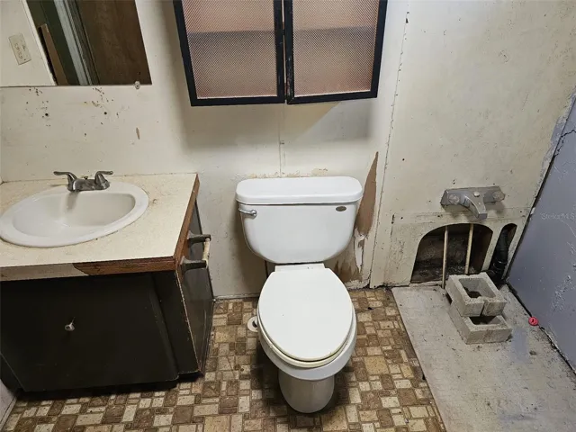 primary bathroom from bedroom with barn door