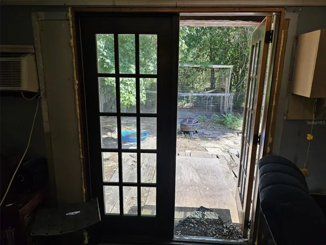 French doors to back yard from living room