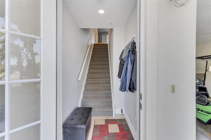 Entrance to home from the front and garage area.