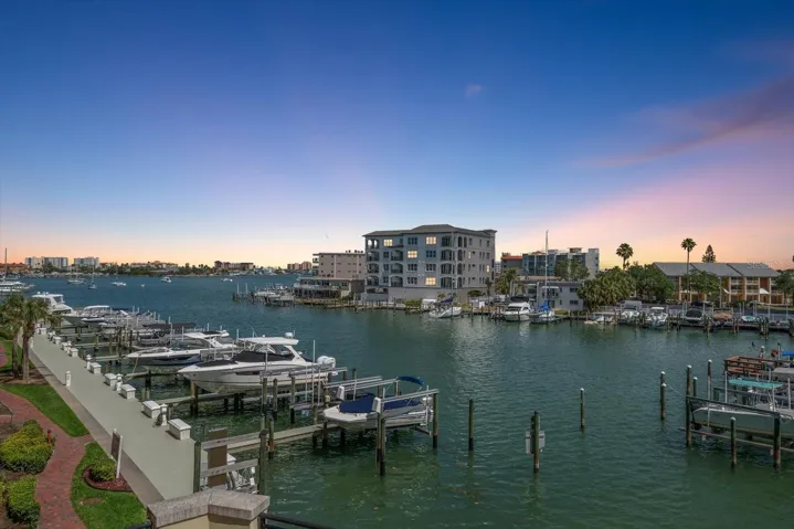 Sunset views on balcony- BOAT SLIP INCLUDED with unit