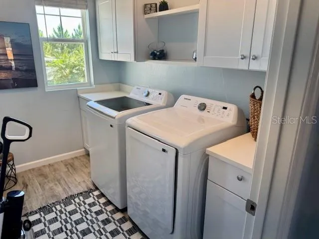Laundary Room with extra shelves and area for folding clothes