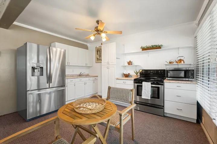 Attached ADA in-law apartment with full kitchen.