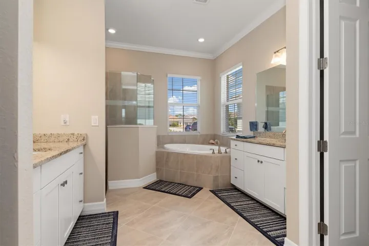 Main bathroom includes tub and shower.