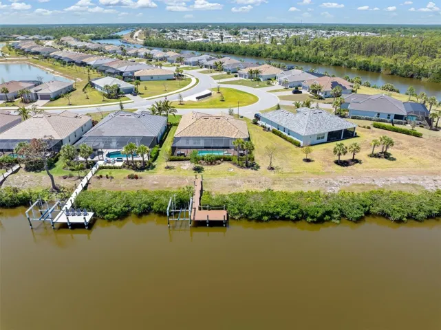 Property protected by mangrove, cut annually by HOA.