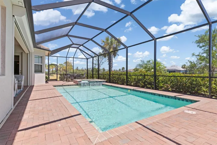 Paver deck and saltwater pool.