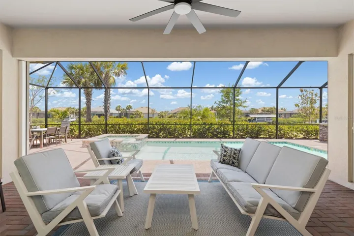 Covered lanai overlooking the pool and canal.