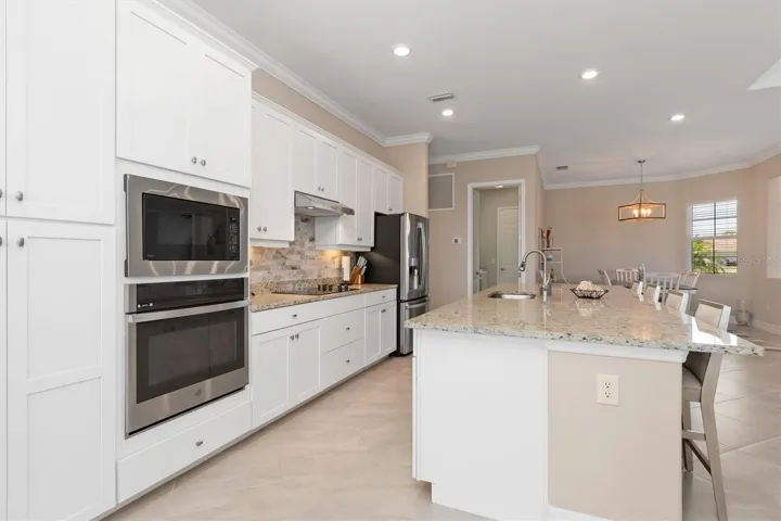 GE oven and Microwave. Custom backsplash.