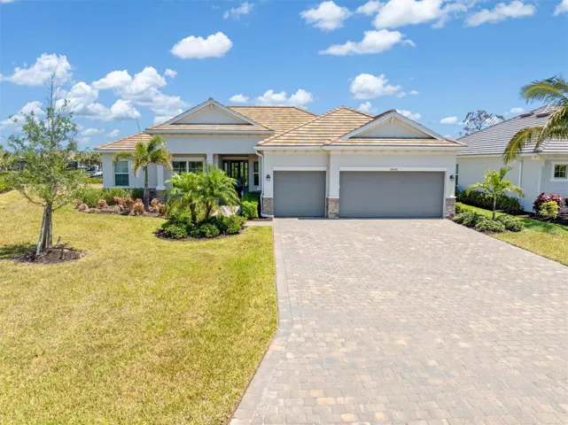 Long driveway and established landscaping.