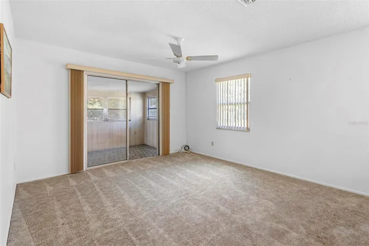 Living room with view of Florida room