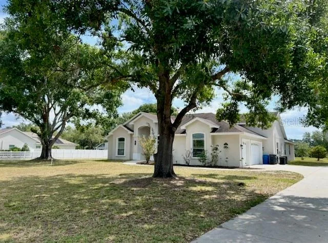 Exterior Front with Driveway Leading to 3 Car Garage
