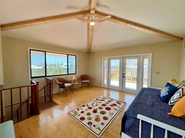 French doors lead to the balcony where you can watch the sunsets