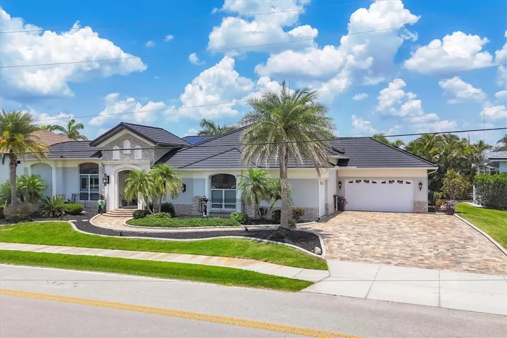 Front of Home - Metal Roof that Looks Like Tile