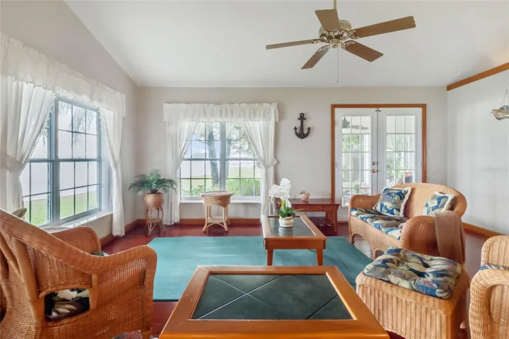 Great Room features French Doors leading onto the Screened-in Lanai