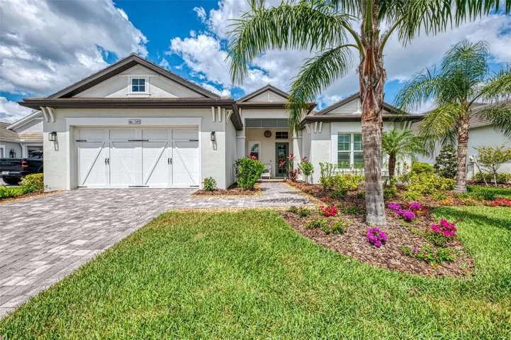 Welcome to 749 Tailwind Place in Lakehouse Cove on Waterside Lakewood Ranch.