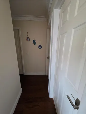 split plan hallway with 3 bedrooms