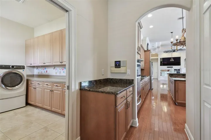Hallway to laundry room from kitchen.