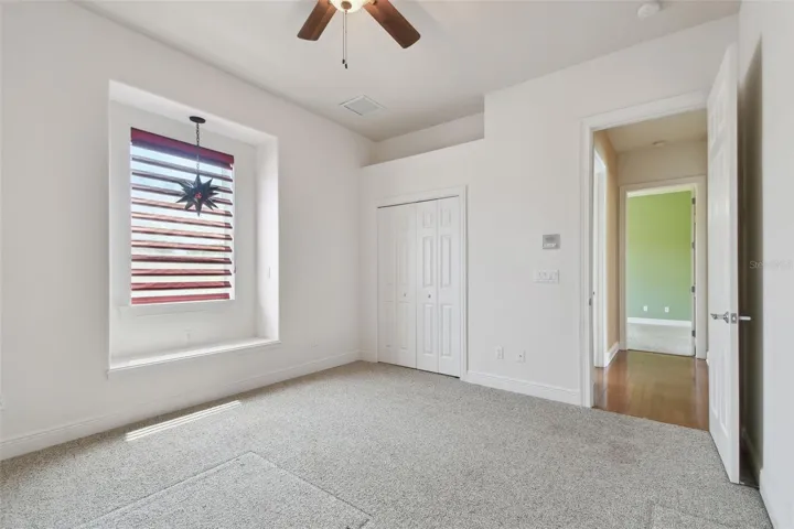 Bedroom Three with window seat.