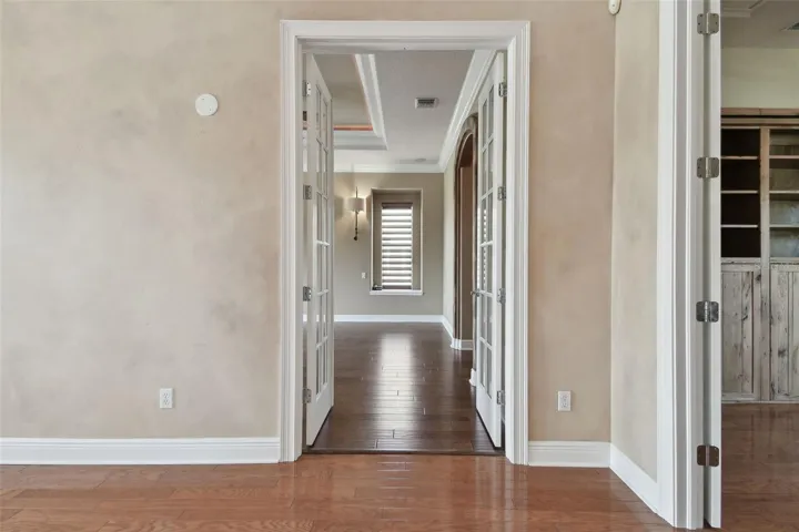 Entry way to Primary Suit through French doors.