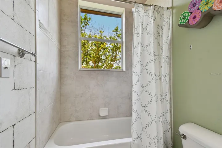 Tub/shower in Bathroom Two.