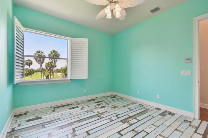 Bedroom One with views of the golf course