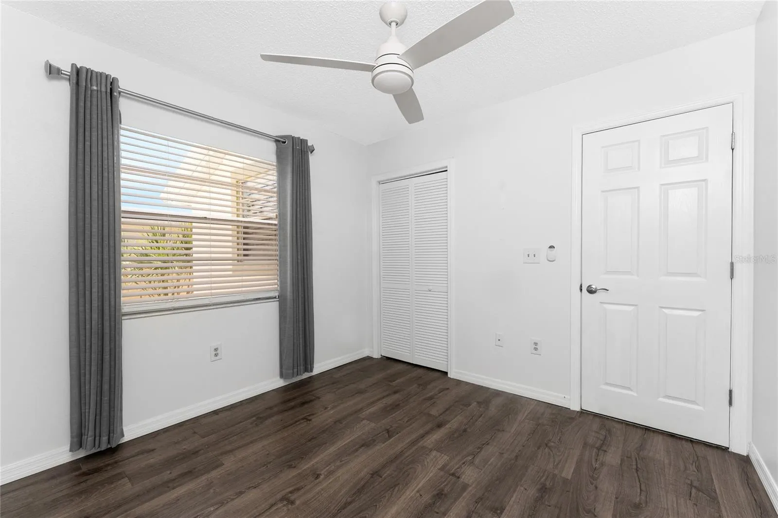Guest bedroom has a wall closet