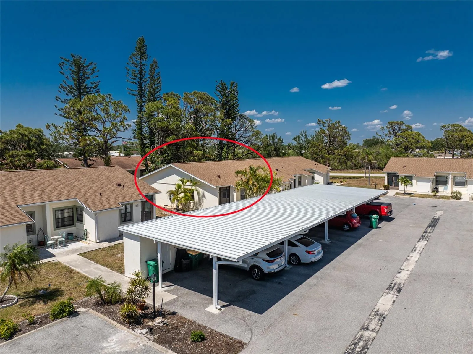 Aerial 2 - carport assigned to this unit is about midway in the row of carports