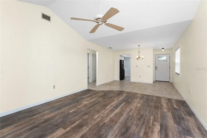Main living area has updated laminate flooring.
