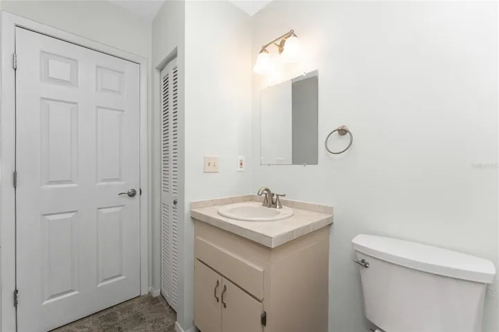 Linen closet in Guest bath provides additional storage