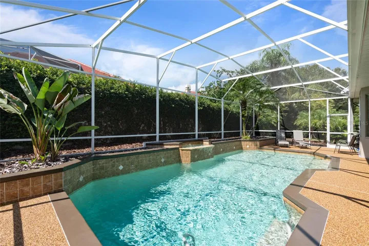 Your private pool oasis is walled in offering extreme privacy not being overlooked by any of the neighbors.