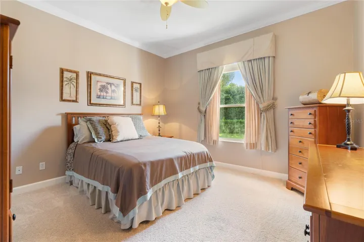 Bedroom 3 featuring a walk in closet