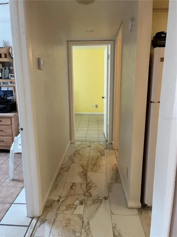 Hallway and 2nd bedroom on the left.