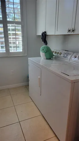 laundry room with storage