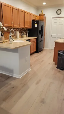 Large kitchen with breakfast bar and pantry