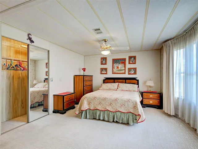 PRIMARY BEDROOM HAS A BUILT IN CLOSET AND A WALK IN CLOSET