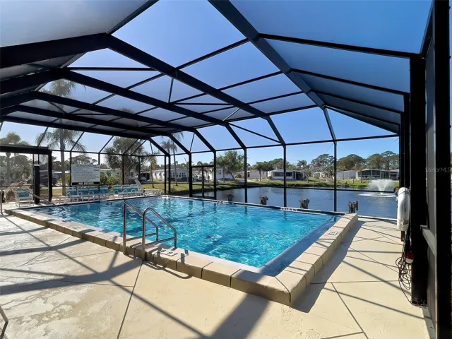 POOL AND SUNDECK WITH A LOVELY WATER VIEW
