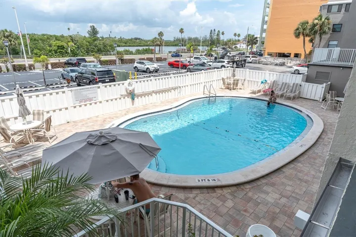 Relax in this inviting pool after a day at the beach