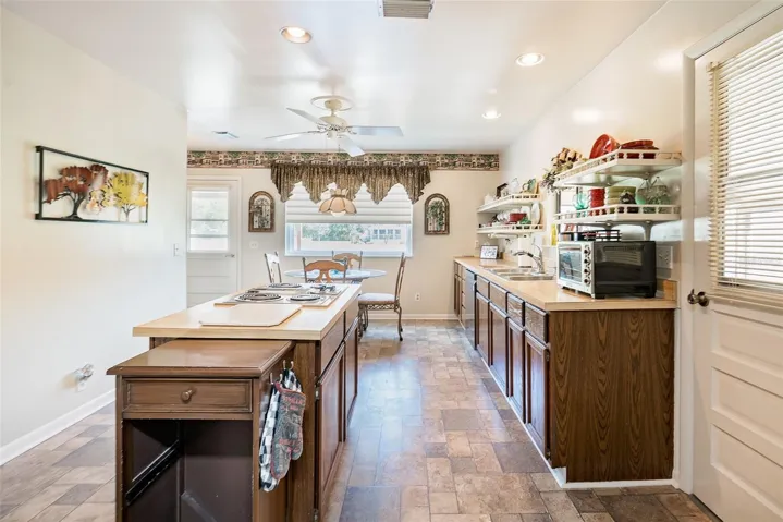 High Ceilings, Cabinet storage Galore, View of the kitchen from the pantry door.