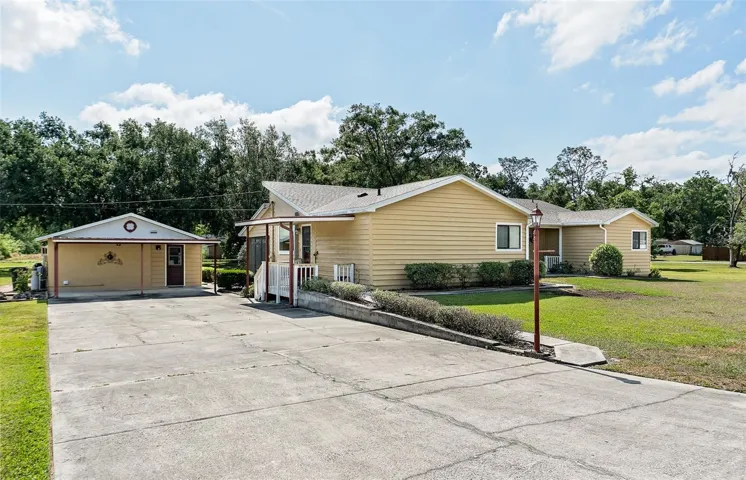 Many vehicles  are able to park in this generously layout driveway!! RV or Boat parking is an option also!!