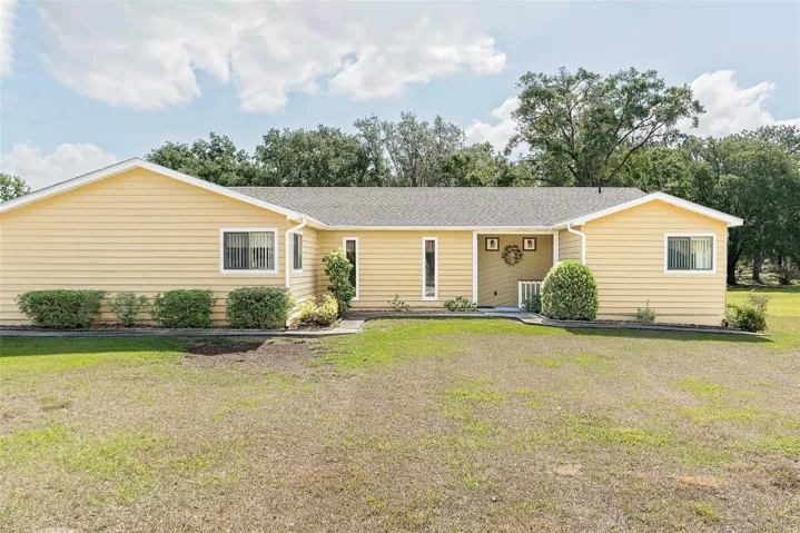 Front Elevation features a sidewalk all the way from the driveway to the front door!