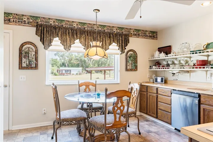 Nicely appointed Kitchen has a NEW Hurricane rated Picture WINDOW! Update appliances also are a nice feature & of course a walk in closet Pantry!!