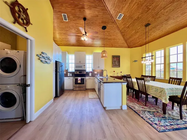 Second level kitchen with laundry/pantry to the left