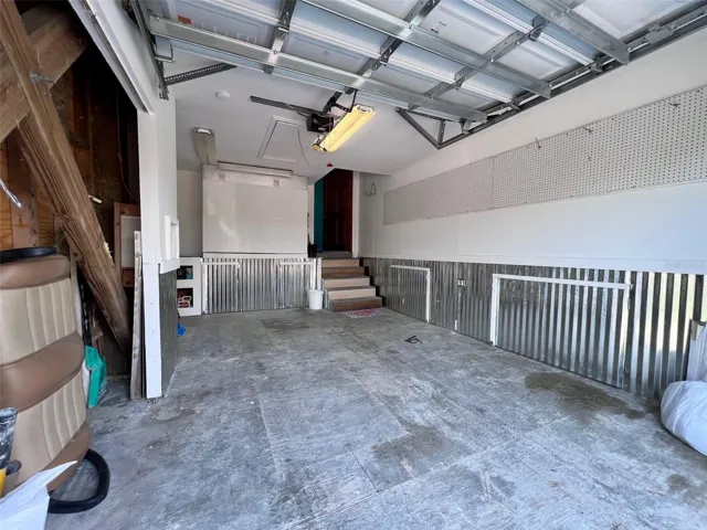 Built in storage behind the corrugated metal