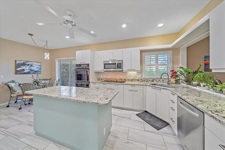 Kitchen w/ Double Oven & Convection Cooktop