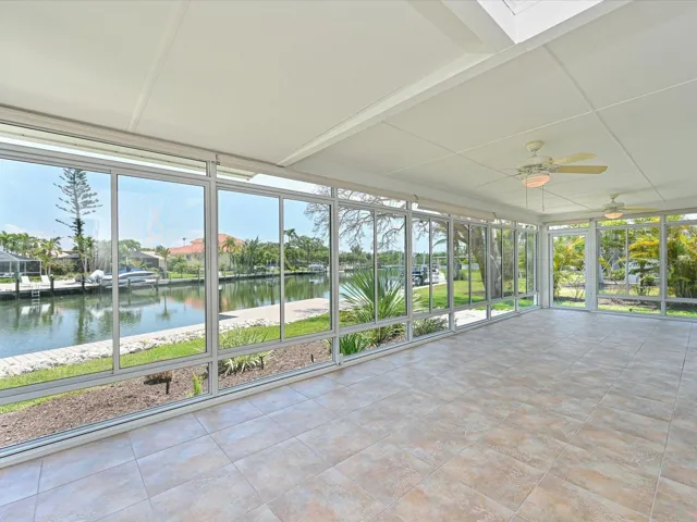 Enclosed lanai with canal view